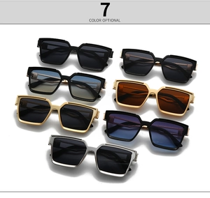 Flat lay of seven colorful square frame sunglasses with metal hinges and sleek finish