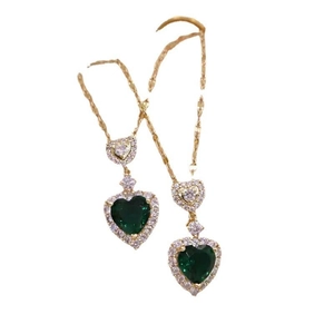 18K gold heart earrings with emerald green gemstones and sparkling zircon accents