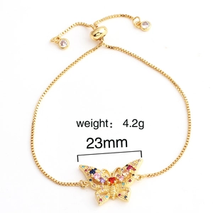 Adjustable gold bracelet with colorful cubic zirconia butterfly and crystal accents