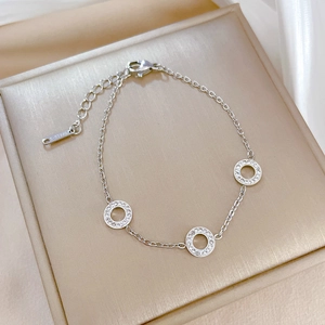 Sparkling stainless steel link chain bracelet with three rhinestone-encrusted circles
