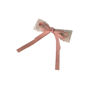 Pink ribbon and beige lace bow hair clip for girls, minimalist style on white background