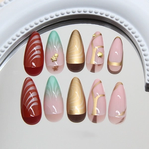 Starfish shell textured almond press-on nails with wave patterns and gold accents