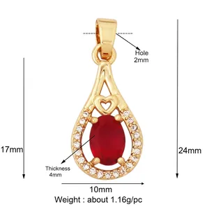 Detail of teardrop gold plated pendant with red zircon and white pave stones, 10x24mm size