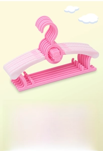 Detail of pink stackable baby hangers with telescopic arms and non-slip thick material