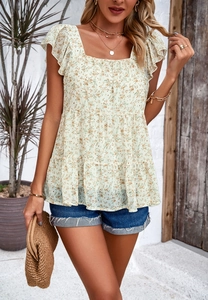 Detail of floral chiffon blouse with square neckline and ruffled layered sleeves