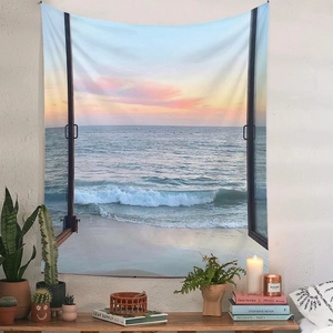 Detail of bohemian sunset sea view tapestry with window frame design on white wall
