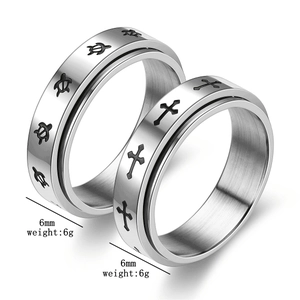 Detail showing 6mm rotatable spinner ring with cross and turtle engraving patterns