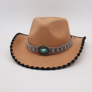 Detail of camel wool felt jazz hat with ethnic pattern band and turquoise stone accent