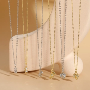 Chic necklace collection featuring bear and elephant pendants with sparkling zircon details