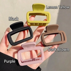 Matte rectangular hollow hair claws in black, yellow, brown and purple colors