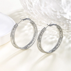 Minimalist silver chain texture hoop earrings with polished finish and latch closure