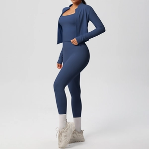 Detailed side view of high-stretch navy blue 3-piece yoga set with zip-up jacket and leggings
