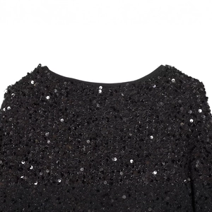 Fashionable black sequin jacket featuring a classic round neckline and dense sequins