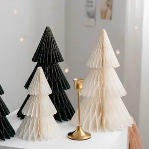 Minimalist paper Christmas tree decorations with gold glitter edges in dark green and cream