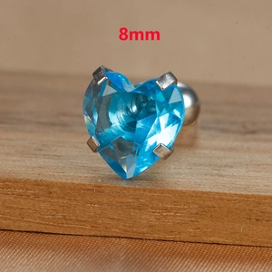 Macro shot of 8mm heart-shaped blue zircon stud earring made of titanium steel