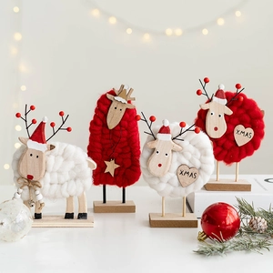 Nordic wool felt Christmas deer and sheep ornaments on wood base for holiday table decor