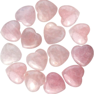 Polished 2cm rose quartz heart stones for home decor and gifts on white background
