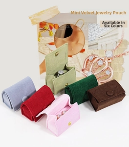 Mini velvet jewelry pouches in six colors with snap buttons for rings and earrings