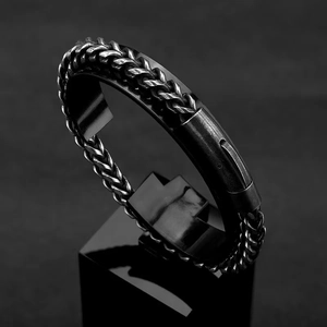 Detailed view of a vintage punk dragon bone chain bracelet in black titanium steel