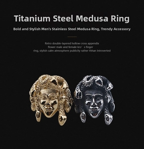 Detailed close-up showing gold and silver Medusa head relief rings in vintage punk style