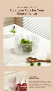 Detail of vertical ribbed soda-lime glass salad bowl with elegant clear texture