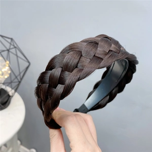 Close-up of deep brown fishtail braid headband with high-quality synthetic hair texture