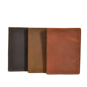 Three colors of genuine crazy horse leather coin purses in black and shades of brown