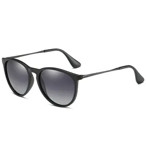 Classic polarized cat-eye sunglasses with black frame and grey gradient lenses