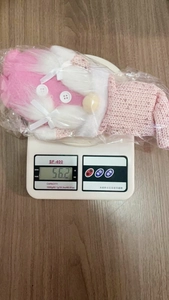 Pink and white Christmas plush gnome decoration with knitted hat weighing 56.2 grams