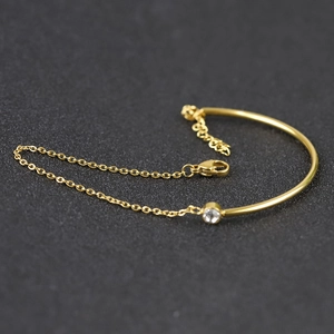 Minimalist 18K gold-plated stainless steel bangle with sparkling zircon and link chain