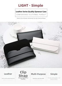 Minimalist leather sunglasses pouches in black and white shown on a white display stand