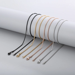 Minimalist stainless steel round snake chains in black, gold, rose gold and silver colors