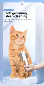 Self-cleaning pet brush grooming an orange tabby cat on a light blue background