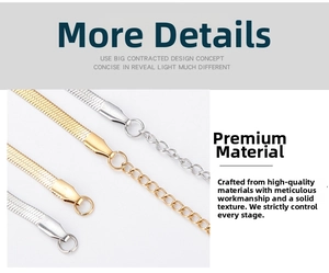 Detail view of gold and silver flat snake chains with extension rings and silk texture