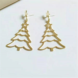 Detailed view of hollowed-out golden Christmas tree earrings with star stud accents