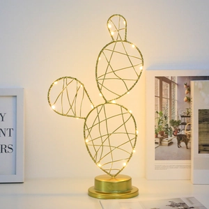 Golden cactus LED desk lamp with metal mesh design and warm light for home decor