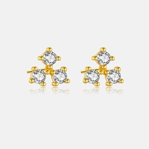 Detailed view of gold S925 sterling silver stud earrings with three round zircon stones