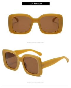 Macro view of wide-frame rectangular yellow sunglasses with brown lenses from multiple angles