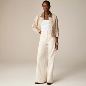 High waist wide leg trousers in cream white paired with khaki short jacket and white top