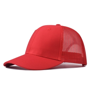 Detailed side view of a red mesh trucker hat with durable curved brim and firm front crown