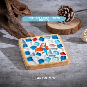 DIY bamboo coaster kit with colorful glass mosaics and cartoon superhero character