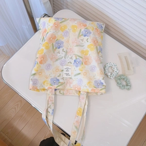 Floral print cotton canvas tote bag with colorful small flowers for summer fashion
