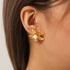 18k gold plated stainless steel flower stud earrings with pearl for women, modeled view
