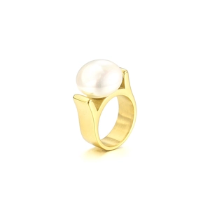 Modern gold-plated wide band ring with a large white pearl center on white background