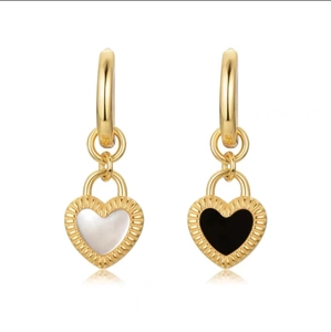 Vintage gold heart earrings with asymmetric black and white pendants in minimalist style