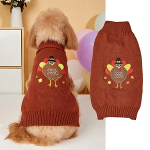 Detail of caramel knit pet sweater featuring turkey embroidery and ribbed turtleneck