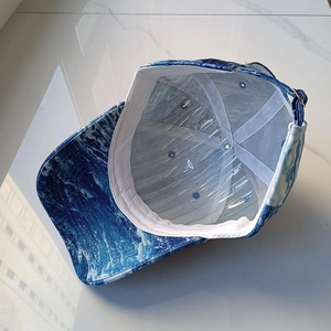Blue and white marble pattern baseball cap with adjustable strap and metal buckle