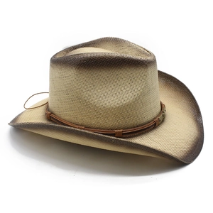 Detail of hand-painted cowboy straw hat with gradient brown brim and decorative rope