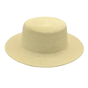 Close-up showing the fine straw weave texture of a classic flat-top summer sun hat