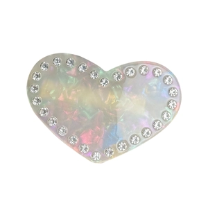 Sparkling heart-shaped acetate hair clip with colorful iridescent finish and crystal rhinestones